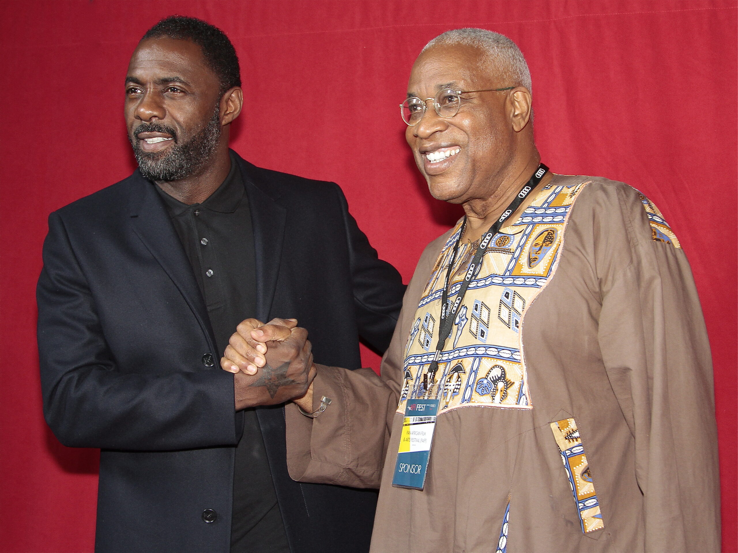 Ayuko Babu  and Idris Elba 