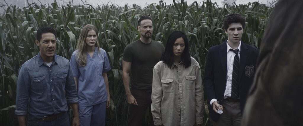 Theo Rossi as Tyler, Jordan Claire Robbins as Sam, Shane West as Ryan, Elena Juatco as Denise, and Julian Feder as Ethan in Escape The Field. Photo Credit: Courtesy of Lionsgate