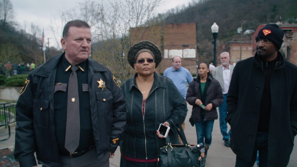  Van
Jones, Sheriff Martin West, and Virgie Walker walk through downtown Welch, West Virginia in a
scene from THE FIRST STEP.
Image courtesy of Meridian Hill Pictures and Magic Labs Media