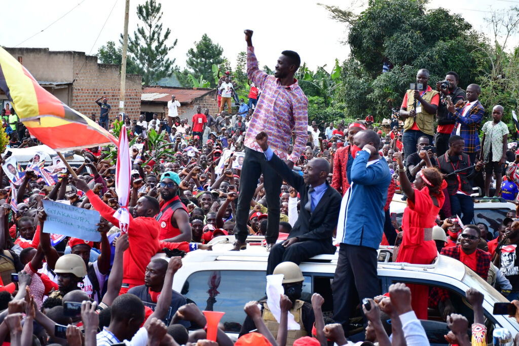 Bobi Wine on top of his vehicle during the 2021 presidential campaigns as he solicited for support in Nakaseke, Central Uganda on November 18, 2020.  (photo credit: Lookman Kampala)